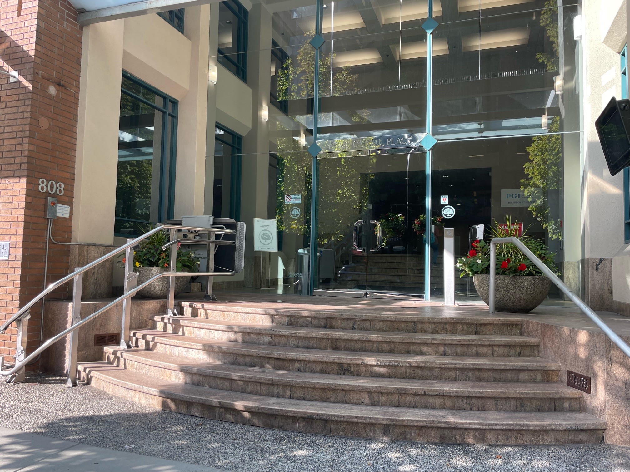 Photo of the PGT Vancouver office building and front doors.